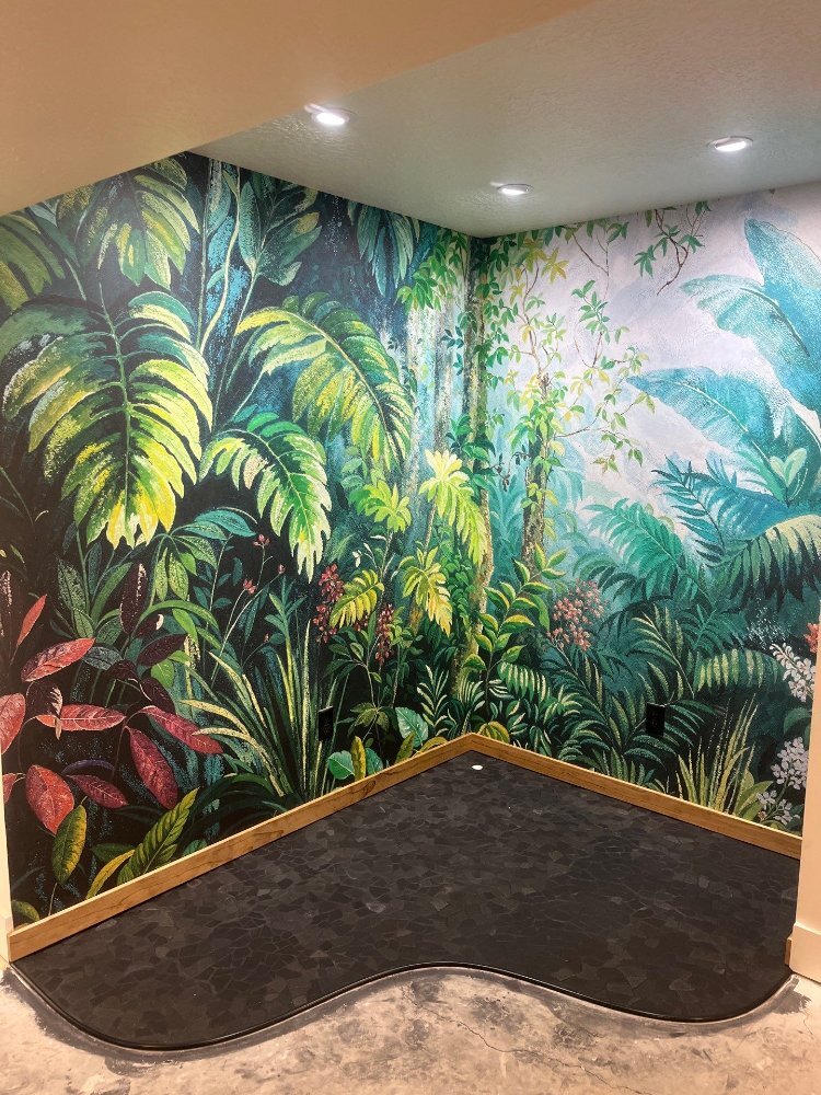 Creative basement accent room by RemodelCo in Daybreak, UT showcasing vibrant tropical wallpaper and modern finishes.-optimized