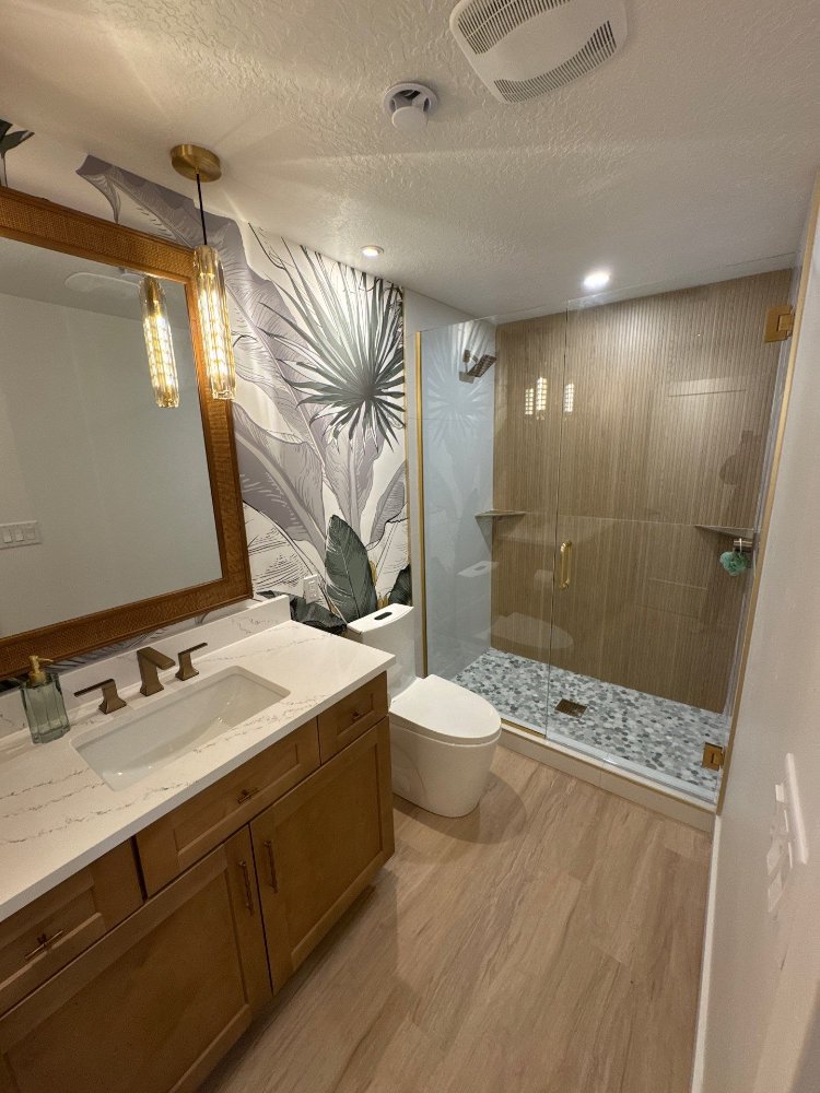 Finished basement bathroom in Daybreak, UT completed by RemodelCo with luxury shower tile, custom vanity, and contemporary fixtu-optimized