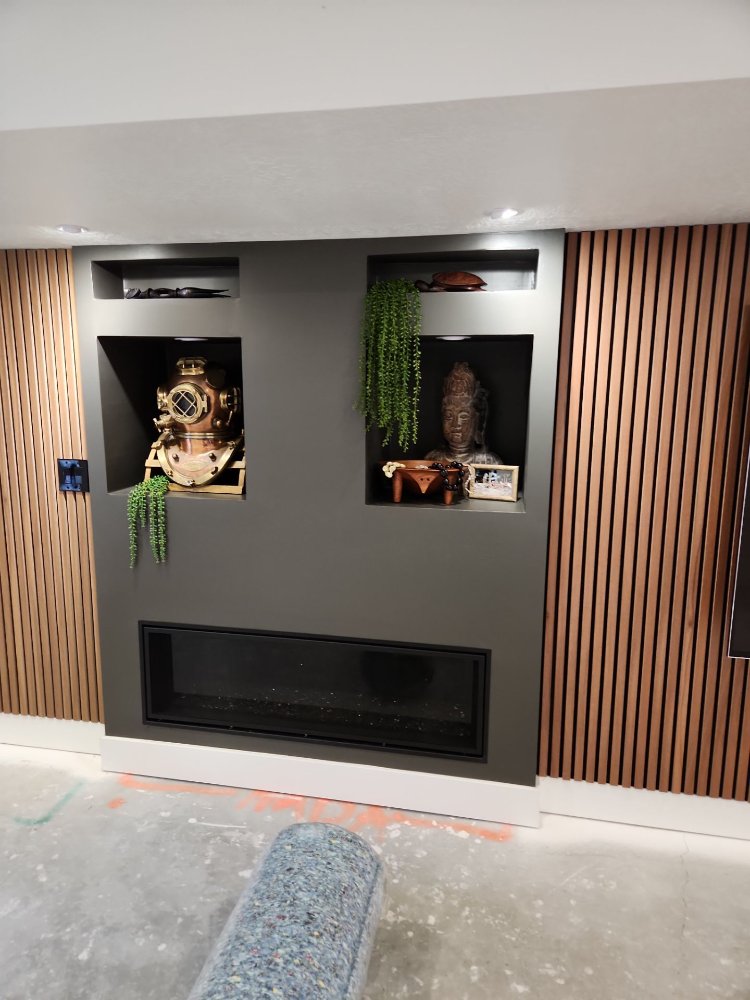 RemodelCo basement bedroom finish in Daybreak, UT featuring soft carpeting, modern lighting, and a functional family-friendly la-optimized
