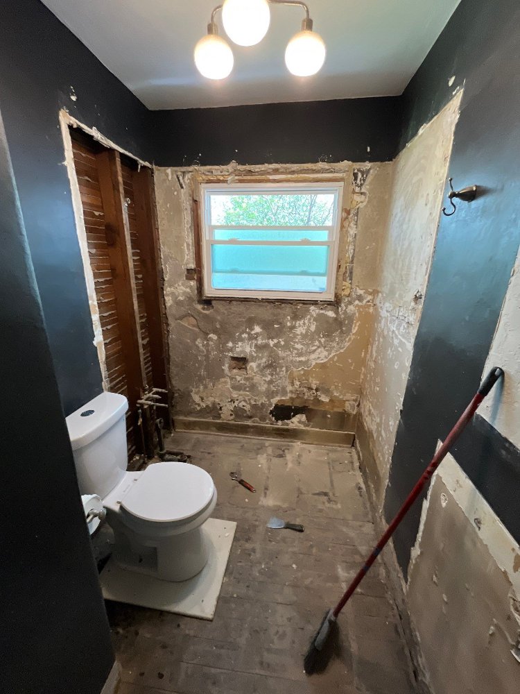 Bathroom renovation by RemodelCo in Salt Lake City, UT showing extensive demolition and preparation for new finishes.-optimized