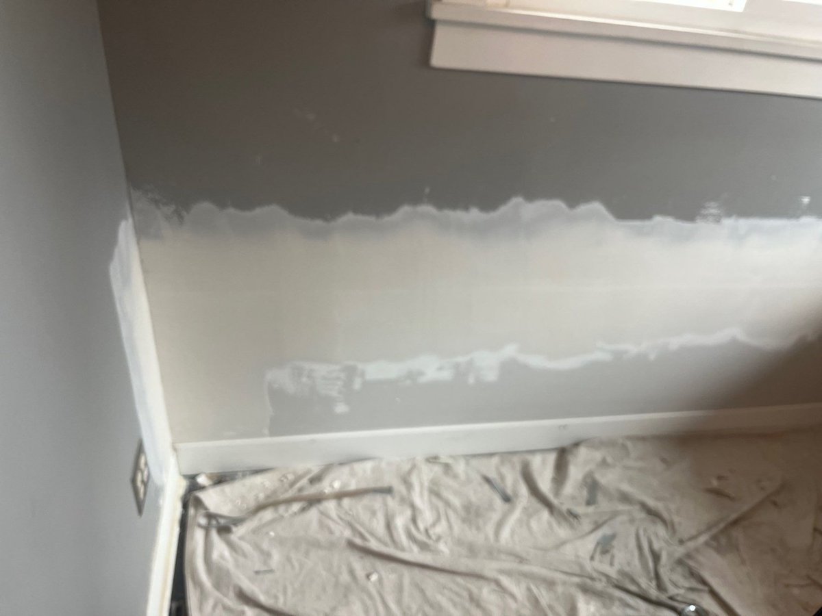 Newly repaired wall prepared for final finishing during RemodelCo remodel in Salt Lake City, UT.-optimized