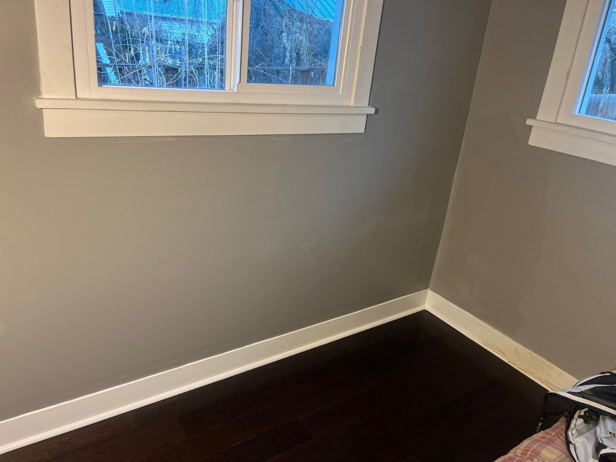 Repaired and painted bedroom wall completed during RemodelCo remodeling project in Salt Lake City, UT.-optimized