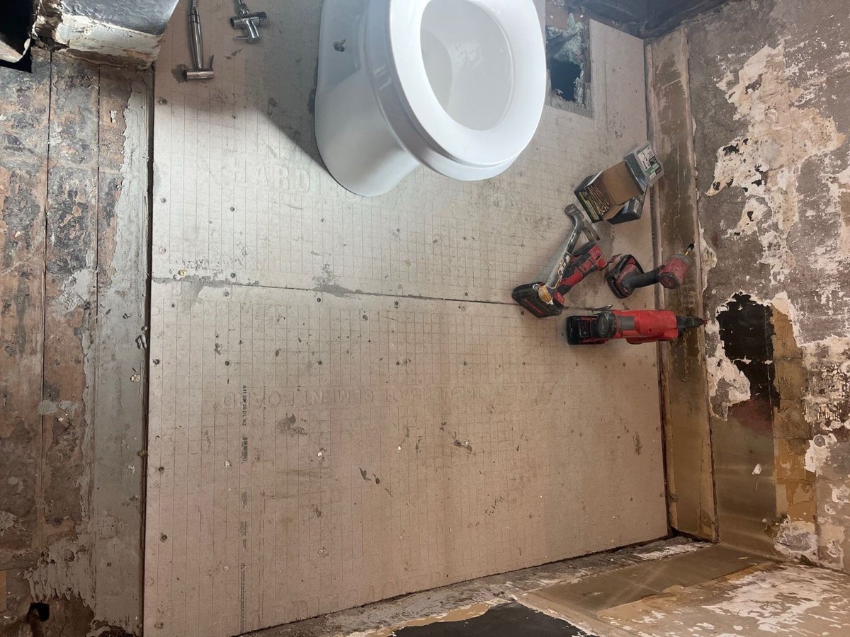 Salt Lake City bathroom remodeling project by RemodelCo featuring subfloor preparation for a complete bathroom upgrade.