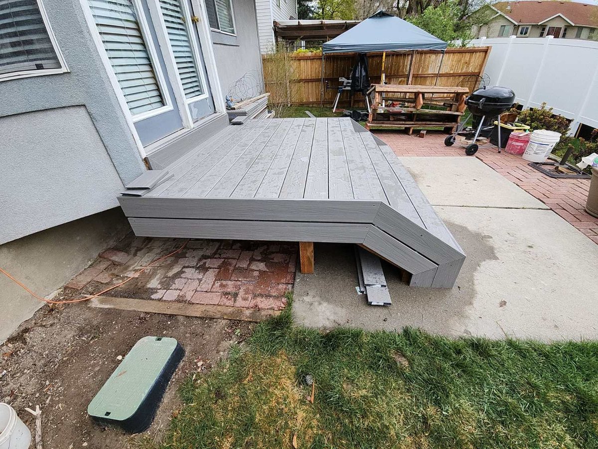 Residential deck renovation showcasing composite decking and upgraded outdoor access in Midvale, UT by RemodelCo.-optimized