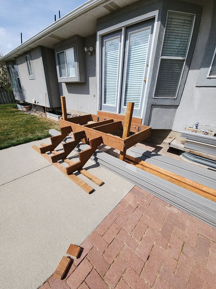 Structural framework for a custom deck replacement project by RemodelCo in Midvale, UT.-optimized