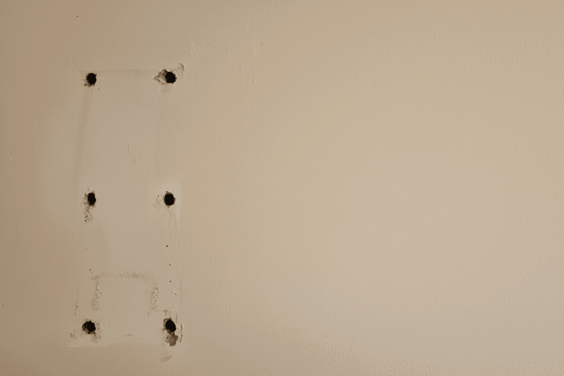 Image of holes in drywall
