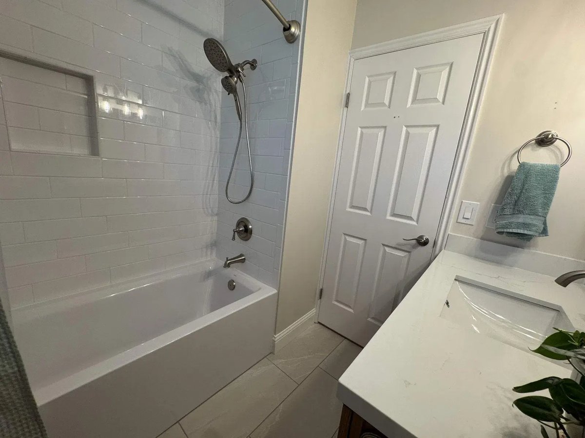 East-Sandy-Whole-Home-Remodel-by-RemodelCo-bathroom-vanity-and-tub-064