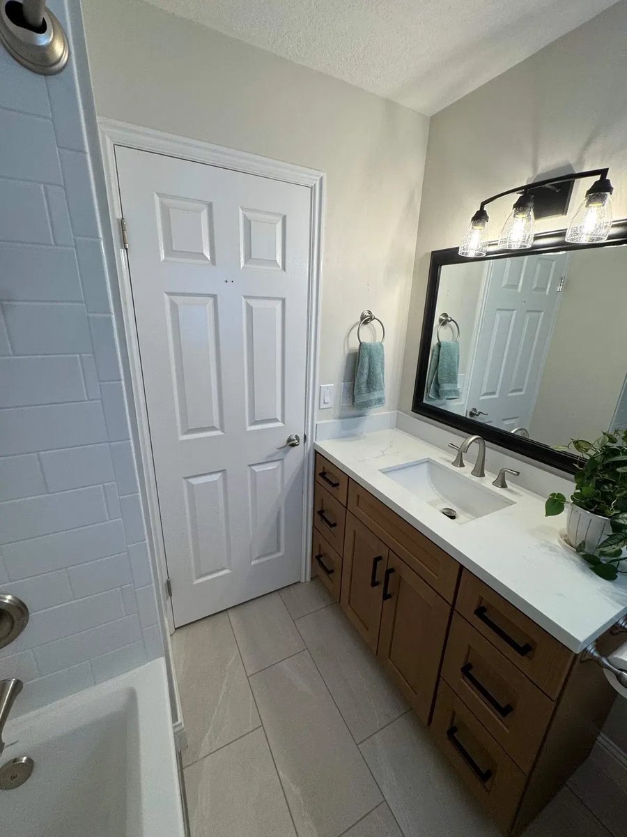 East-Sandy-Whole-Home-Remodel-by-RemodelCo-bathroom-vanity-and-tub-103