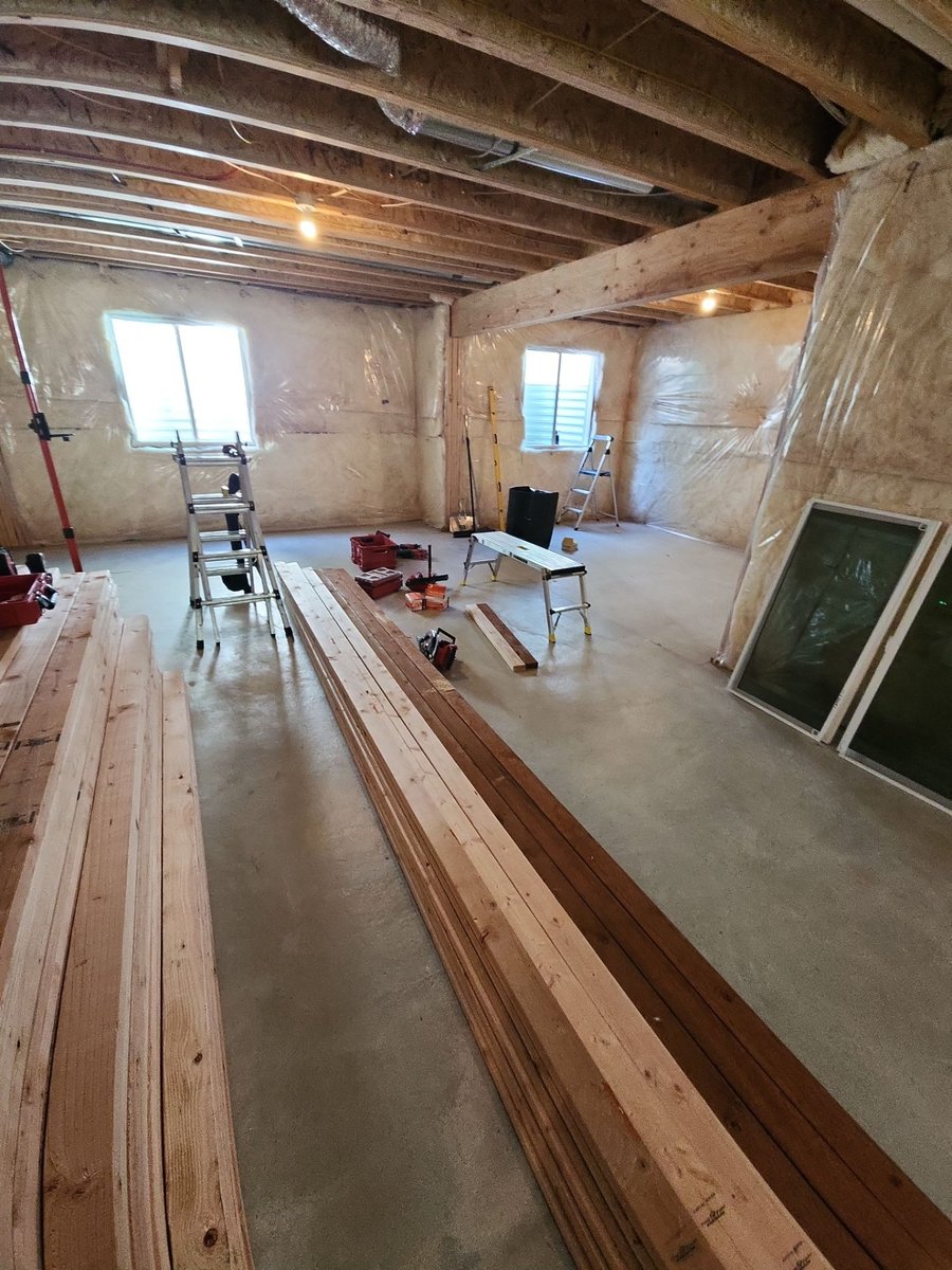 Basement framing and electrical rough-in during a Herriman basement finish.